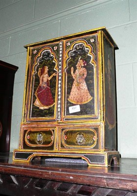 Lot 457 - An Indian painted miniature cabinet