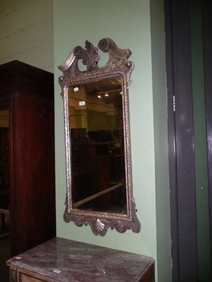 Lot 466 - A pier glass in silvered wood frame