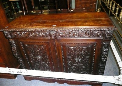 Lot 483 - The base to a Victorian carved oak bookcase