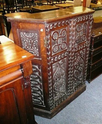 Lot 496 - Carved oak credenza cupboard