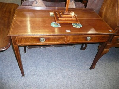 Lot 500 - A mahogany and satinwood banded writing table stamped Heal & Son, London