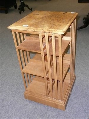 Lot 509 - A burr walnut revolving bookcase