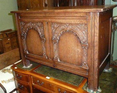 Lot 565 - Reproduction carved oak blanket box and a dome-top trunk