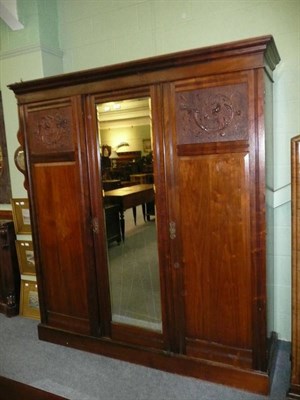 Lot 579 - Late Victorian walnut wardrobe