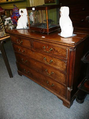 Lot 586 - Oak four height chest of drawers