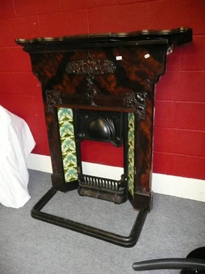 Lot 613 - Arts & Crafts metal fire surround with tiled insert