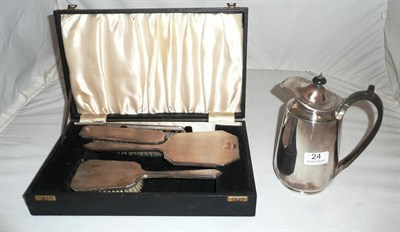 Lot 24 - Silver hot water pot and Art Deco brush and mirror set