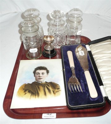 Lot 42 - Four cut glass jars, silver golf trophy, cased plated fish servers and two overpainted portrait...