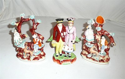 Lot 46 - A Staffordshire group of a lady and gent figural spill vase group and a figural arbour group (3)