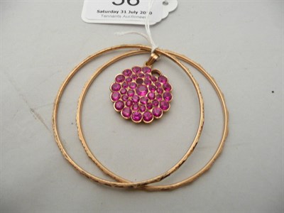 Lot 56 - Two bangles and a pendant (a.f.)