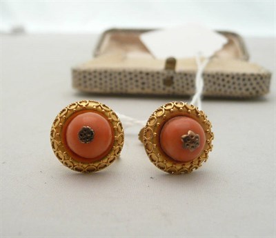 Lot 64 - A pair of Coral-set earrings