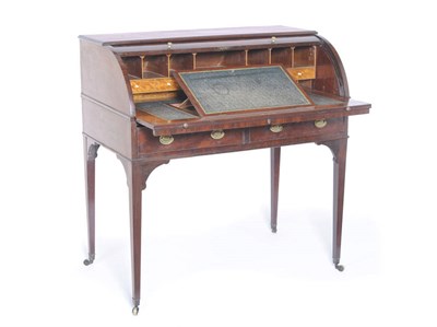 Lot 1435 - A George III Mahogany and Strung Cylinder Bureau, the fall front with fitted interior enclosing...