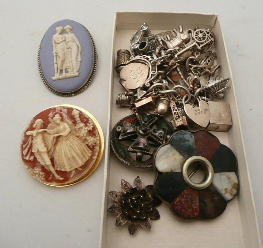 Lot 85 - Silver charm bracelet, hardstone brooch (a.f.) and two other brooches