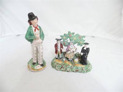 Lot 105 - A Staffordshire double sided figure 'Gin and Water' and a pearlware bocage group with lady and gent