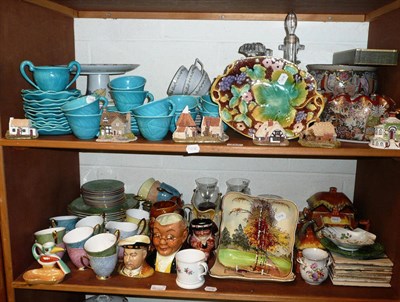 Lot 125 - Two shelves of decorative ceramics including a majolica dish, two Royal Doulton dishes,...