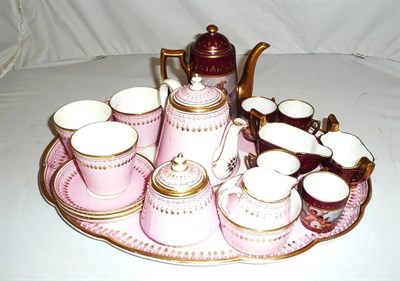 Lot 151 - A 19th century pink and gilt cabaret set, a Vienna-style coffee pot, cream, sugar and four cans