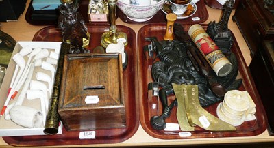 Lot 158 - Two trays of ornamental items including a treen pipe holder carved as a devil smoking a pipe, a...