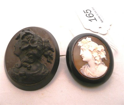 Lot 165 - A carved jet brooch and a cameo brooch