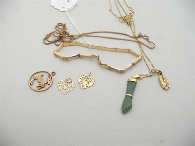 Lot 187 - A 9ct gold brick-link necklace, assorted charms and a two colour bracelet stamped '585'