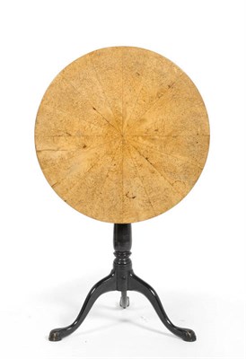 Lot 1460 - A Carolean Birch and Ebonised Tilt-Top Table, the circular segmented top raised on a baluster...