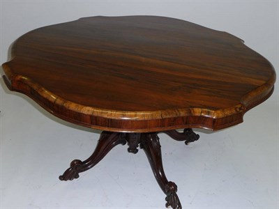 Lot 1468 - A William IV Rosewood Breakfast Table, the shaped circular top with moulded edge and plain...