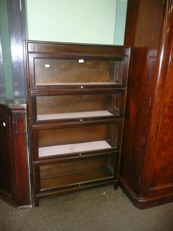 Lot 684 - Oak four height stacking bookcase