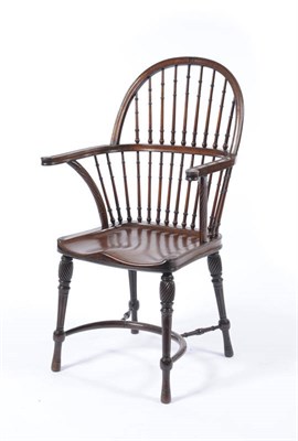 Lot 1499 - A Mahogany Windsor Chair, late 19th century, the arched back with ring turned spindle supports,...