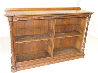 Lot 1503 - A Victorian Gothic Revival Oak, Rosewood and Ebony Open Bookcase, the rounded rectangular top above