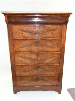 Lot 1506 - A Continental Mahogany Six Drawer Chest, mid 19th century, the rounded top above a cushion...