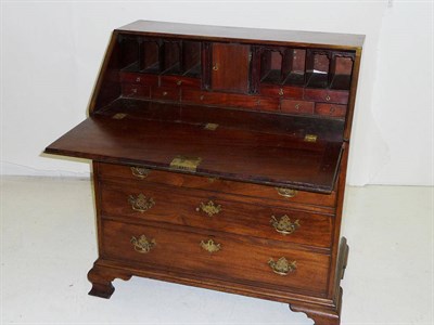 Lot 1508 - A George III Mahogany Bureau, the fall front opening to reveal a fitted interior of small...