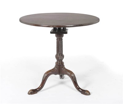 Lot 1511 - A George III Mahogany Pedestal Table, the circular flip-top on a birdcage platform and wrythen...