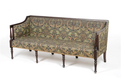 Lot 1520 - A Regency Mahogany Framed Settee, with reeded edge, the slightly downswept arms with reeded bulbous