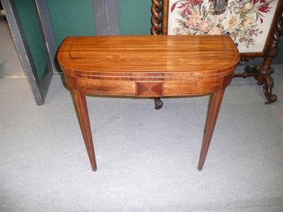 Lot 1538 - A George III Tulipwood and Strung Card Table, the D-shaped top over a crossbanded edge and...