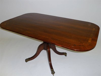 Lot 1546 - A Regency Breakfast Table, the top veneered in Botany Bay oak (Casuarina), rosewood crossbanded and