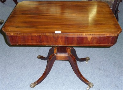 Lot 1547 - An Early 19th Century Dalbergia Centre Table, the rectangular top with canted corners above...