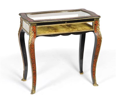 Lot 1556 - A 19th Century French Red Boulle Bijouterie Table, the glazed serpentine top and frieze raised...