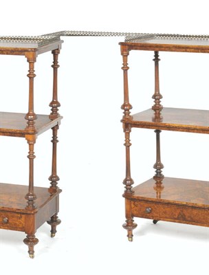 Lot 1579 - A Victorian Walnut Three-Tier Whatnot, the upper section with three-quarter brass gallery with...