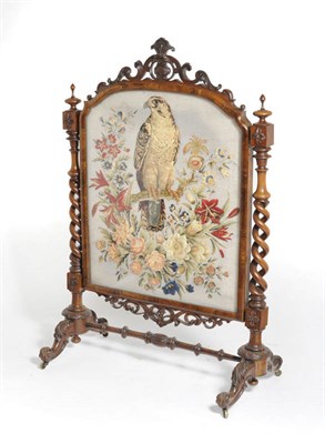 Lot 1581 - An Impressive Victorian Walnut Firescreen, the frame with carved acanthus and scrolling...