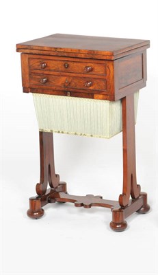 Lot 1585 - A Victorian Rosewood Sewing Table, the pivoting and  hinged top opening to reveal a red baize lined