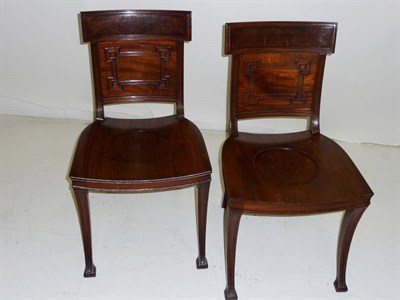 Lot 1592 - A Pair of Regency Mahogany Hall Chairs, the curved backs and rectangular tablet with boxwood...