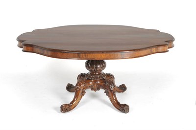 Lot 1597 - A Fine William IV Rosewood Breakfast Table, the shaped oval top with moulded edge, raised on a...