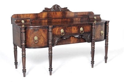 Lot 1599 - A William IV Mahogany Sideboard, the staged top with scrolling and leaf pediment above two...