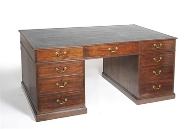 Lot 1600 - A George III Mahogany Partners Desk, late 18th Century the rectangular moulded top inset with a...