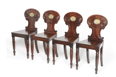 Lot 1604 - A Set of Four William IV Carved Mahogany and Painted Hall Chairs, the rounded shaped backs with...