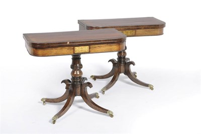 Lot 1614 - A Pair of Regency Rosewood and Brass Inlaid Card Tables, the rounded rectangular tops with...