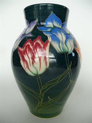 Lot 1632 - A Sally Tuffin for Dennis China Works "Tulips" Baluster Vase, painted with tulips on a green...