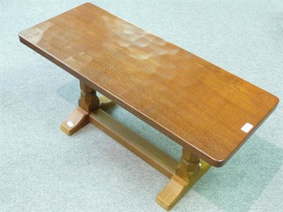 Lot 1693 - A Robert "Mouseman" Thompson Oak 3' Coffee Table, on two octagonal legs joined by a stretcher...