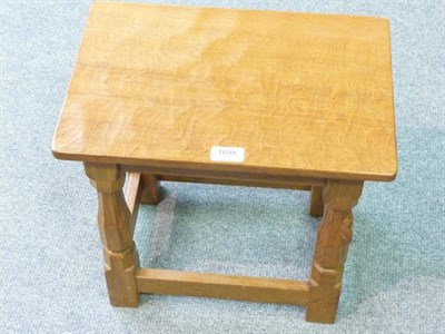 Lot 1698 - A Robert "Mouseman" Thompson Oak Coffee Table, with rectangular top, on octagonal section...