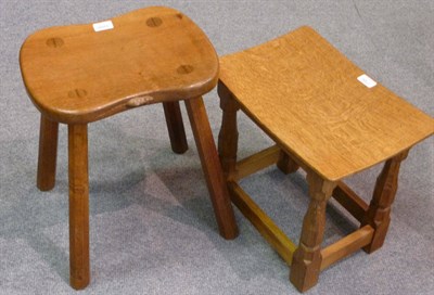 Lot 1700 - A Robert "Mouseman" Thompson Oak Milking Stool, with shaped seat, on octagonal section splayed...