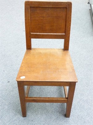 Lot 1711 - Three Robert "Mouseman" Thompson Oak Panel Back and Seat Chairs, on square section legs, joined...